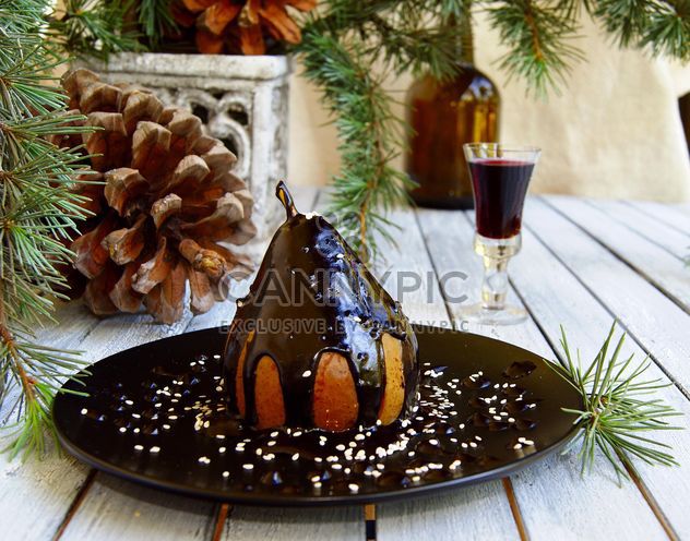 pear in chocolate Christmas dessert - бесплатный image #136649