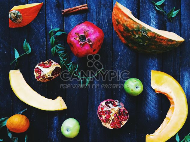 Fruits on wooden background - бесплатный image #186229