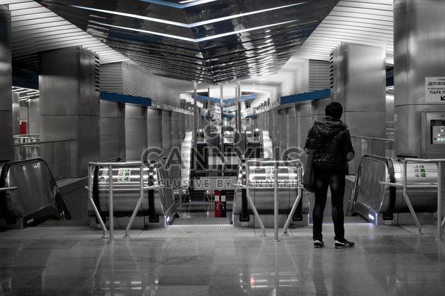 Person near turnstiles at subway station - бесплатный image #200739