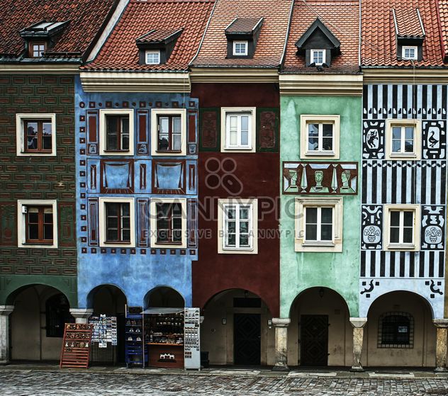 Colored houses on the central square of Poznan, Poland - image #271609 gratis