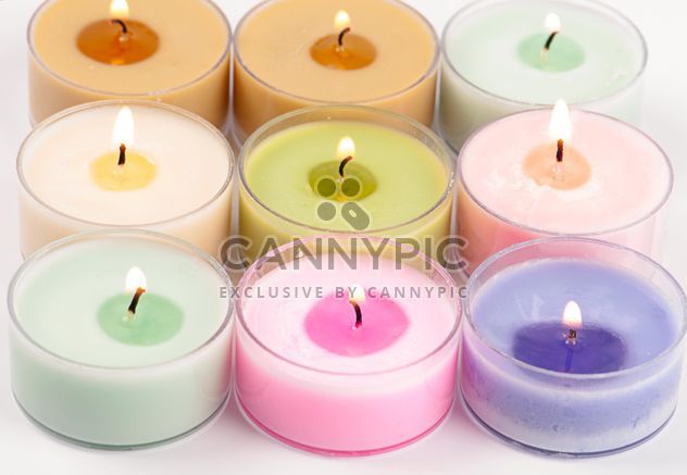 Colored candles on white background - image #272529 gratis