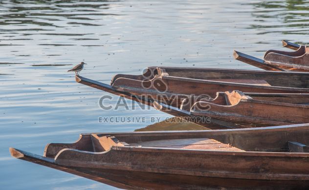 Wooden boats on a pier - image #301459 gratis