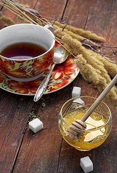 Honey, cup of tea and wheat spikelets - image #302079 gratis