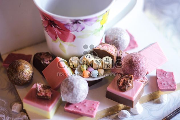 Strawberry Chocolate pieces and tea cup - image gratuit #302779 