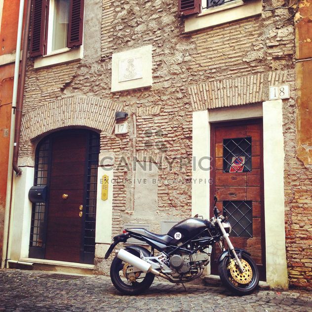 Ducati motorcycle near house - image gratuit #331109 