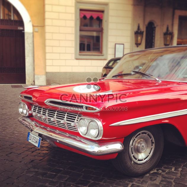 Retro red car in the street - Free image #331719