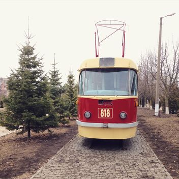 Old red tram in street - image #332199 gratis