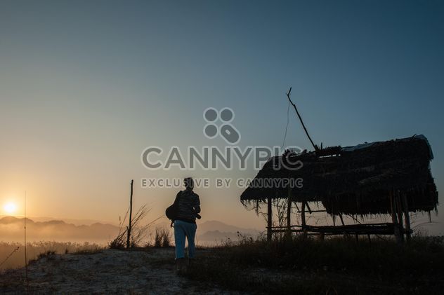 Woman in mountains at sunset - image gratuit #338589 