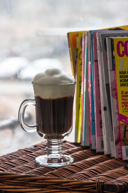 Cup of coffee and pile of magazines - Free image #350309