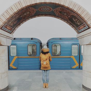 Girl standing on platform at subway station - Free image #363699