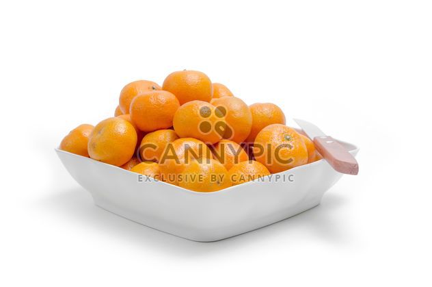 oranges in white plate on white background - image gratuit #452519 