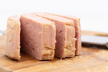 Luncheon Meat served on the wooden board - бесплатный image #474929