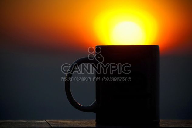 Cup silhouette at sunset - image #183479 gratis
