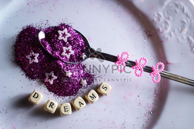 purple shiny sequins in a spoon - image #187309 gratis