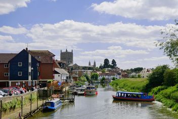 Boats on river and houses on riverside - Free image #198299