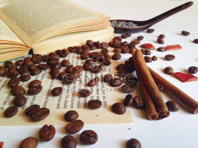 coffee beans on the open book - Free image #198759
