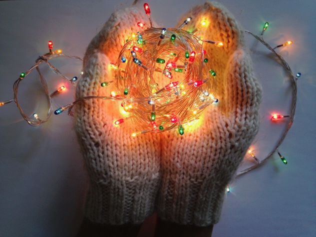 Soft warm knitted mittens hold garland - image #198779 gratis