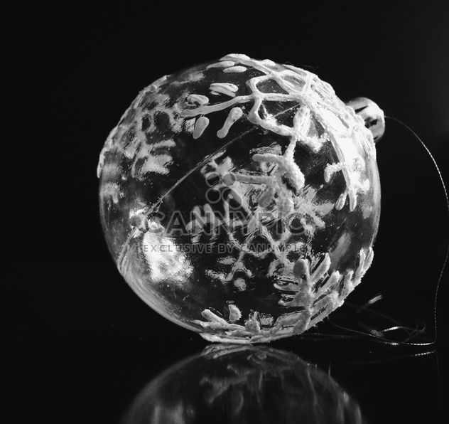 Transparent Christmas ball with snowflakes on a black background. - Free image #198809