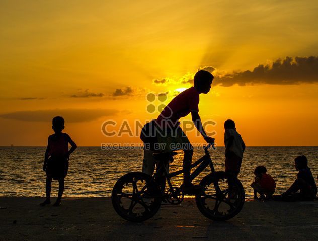 Silhouettes at sunset - Free image #271779