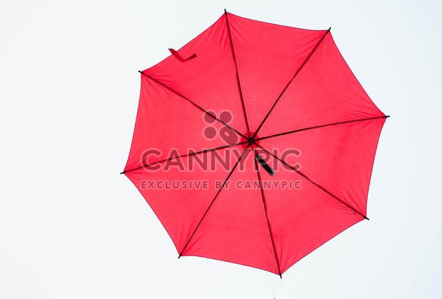 Red umbrella hanging - image #273059 gratis