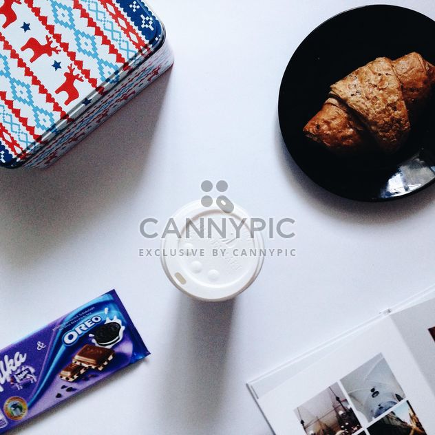 Croissant, chocolate, box and cup of coffee on white background - Kostenloses image #273829