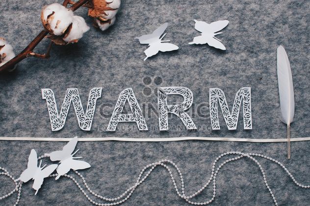 Word warm, cotton branch, featheron felted background - Free image #305759