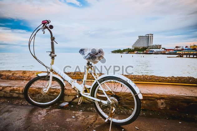 A small bicycle on Hua Hin Fishing pier - image #330309 gratis