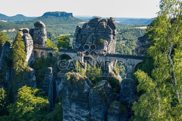 Medieval bridge and rocks - бесплатный image #338599