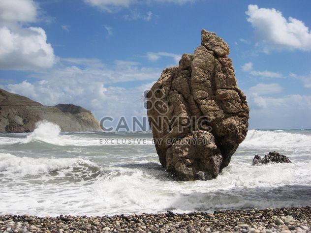 Huge rock on a sea shore in Cyprus - image #342499 gratis