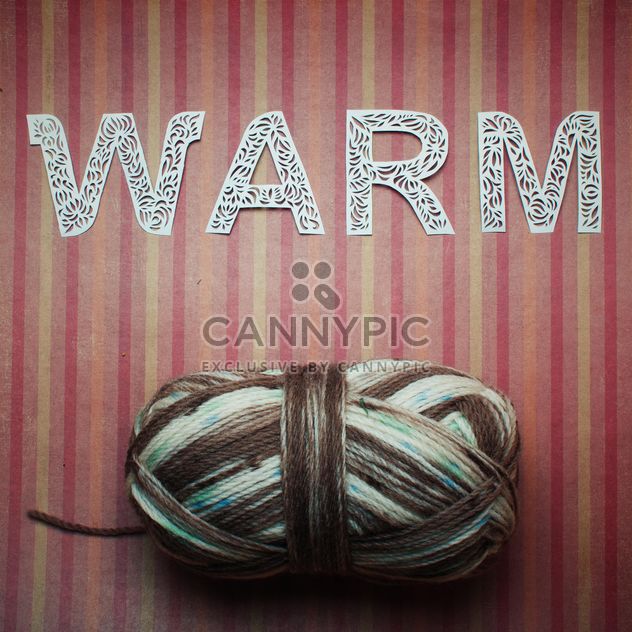Laced letters and yarn on striped background - бесплатный image #342539