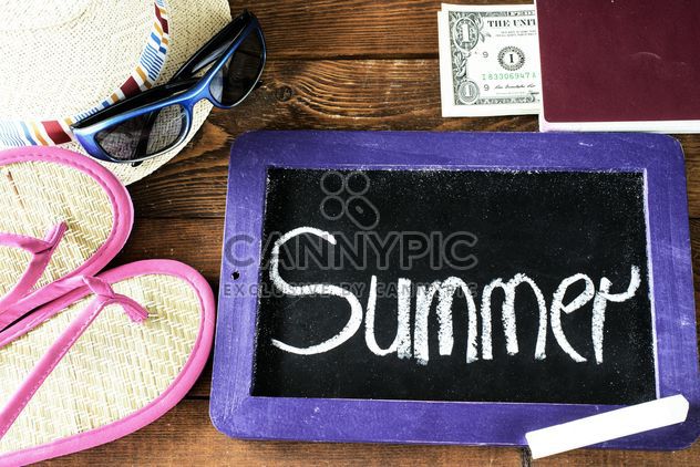 Small blackboard with word summer and summer accessories - бесплатный image #344549