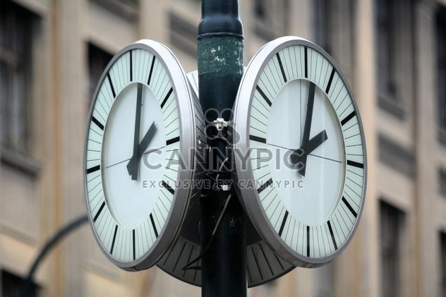 Closeup of city clocks on street - Free image #348489